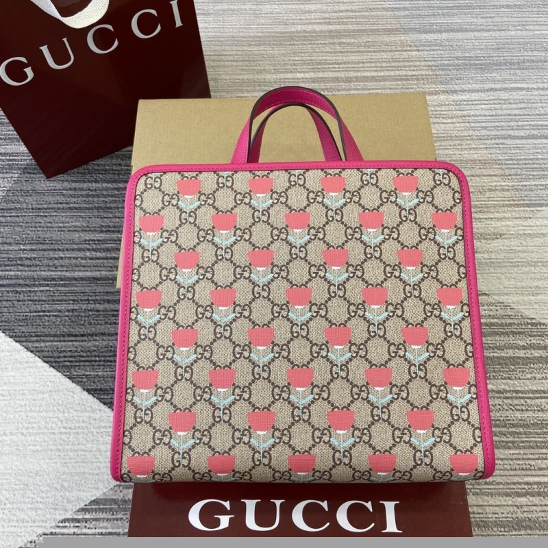 G*u*i shopping bags